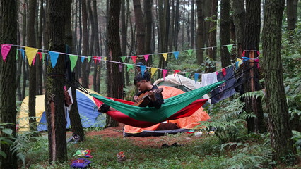 camping tent in the forest © tokyo jawa