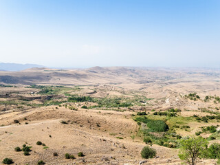 Armenian landscape near Arch of Charents, located in village of Voghaberd, Kotayk region, on Yerevan - Garni road on sunny summer day