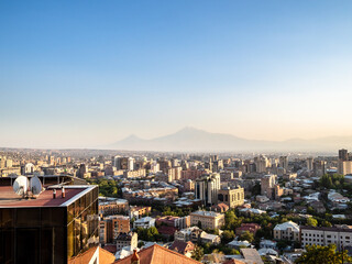 above view of Yerevan city and mountain on horizon from Cascade stairs on summer sunset