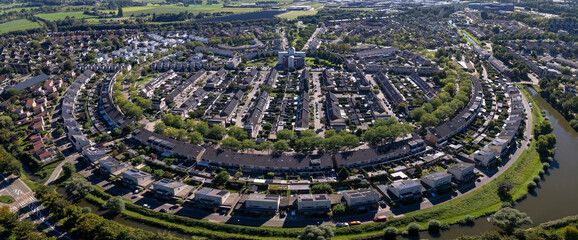 Panorama aerial of residential neighbourhood Leesten in suburbs of Zutphen. City planning, street plan, infrastructure and urban development concept seen from above.