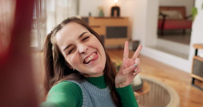Influencer, kiss or face of woman on video call with peace sign or communication in home living room. Love, portrait or girl on chat for live streaming, vlogging or talking to social media followers