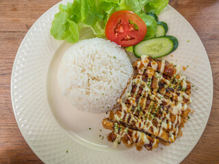 fried pork topping with mayonnaise and rice