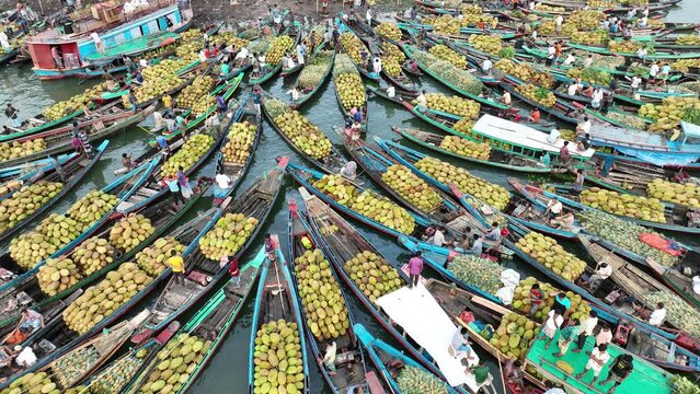 Aerial view of floating market of seasonal fruits on the boats in Kaptai Lake, Rangamati, Bangladesh.