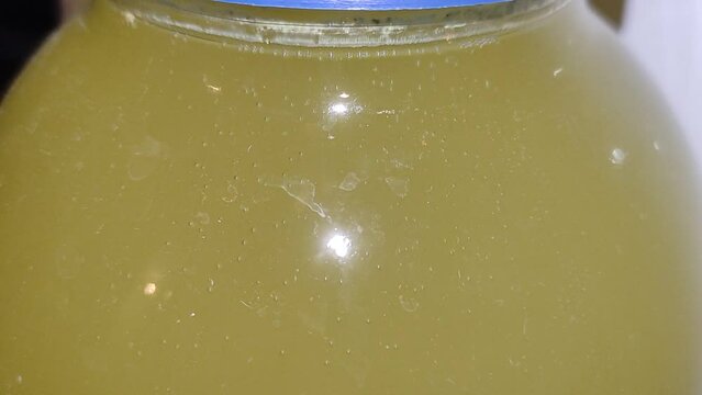 Bubbles and fermentation of the brew, close-up