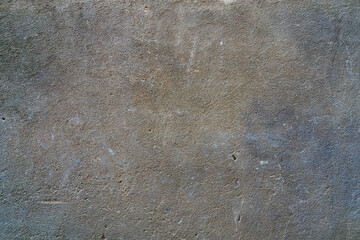 Bringing the bare black and gray cement walls inside, there is yellow, gold, brown, Sam is an ancient old plaster wall that can be used as a background picture or to study fossils or historical