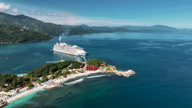 Labadie, Haiti - 31 July 2023: Aerial view of a cruise ship docked at the pier in Cap-Haitien, Haiti.