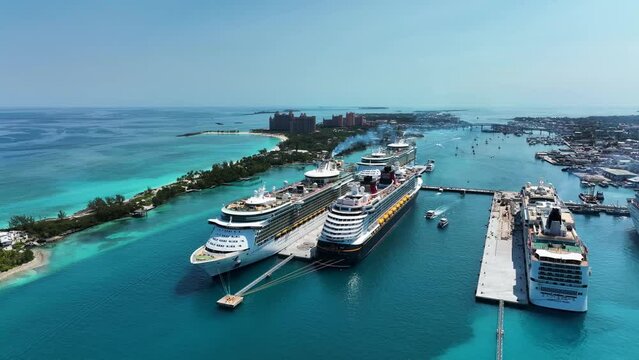 Bahamas - 01 August 2023: Aerial view of cruise ships docked at the port of Nassau on Paradise island along the barrier reef, Bahamas.