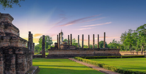 Wat Mahathat  Buddhist temple in Sukhothai historical park. UNESCO and World Heritage Site. Culture and vacation concept.