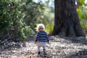 toddler walking in nature