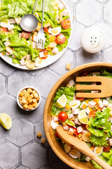 Bowl with caesar salad on a table