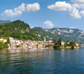 Naklejka na ściany i meble Town on Lake Como coast (Italy). Summer view from ship board