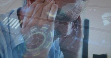 Animation of interface with data processing against close up of a caucasian senior man at office - Powered by Adobe