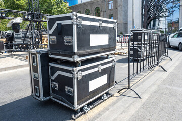Cases with musical equipment. Boxes with concert equipment on wheels. Cases for transporting...