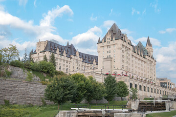 Fototapeta na wymiar Beautiful view of the Fairmont Chateau Laurier on the Rideau Canal in Ottawa, Canada