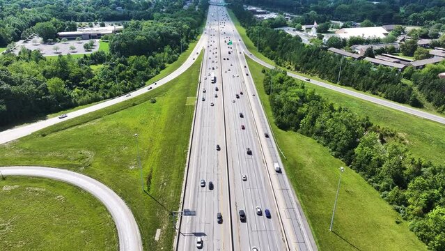 Aerial view of vehicles driving on the interstate near Columbus town, Ohio, United States.