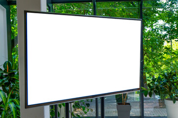 Screen with a white background in a conference room. TV set with place for text. Copy space mockup...