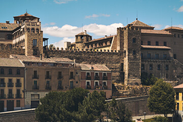 Fototapeta na wymiar Ancient architecture against blue cloudy sky of Segovia city. Castilla y Leon. Spain