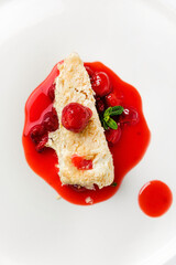 napoleon cake with cherry sauce and mint