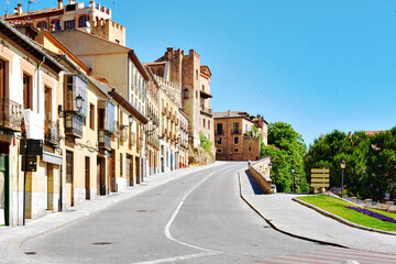 Empty road and street, typical residential houses of Segovia