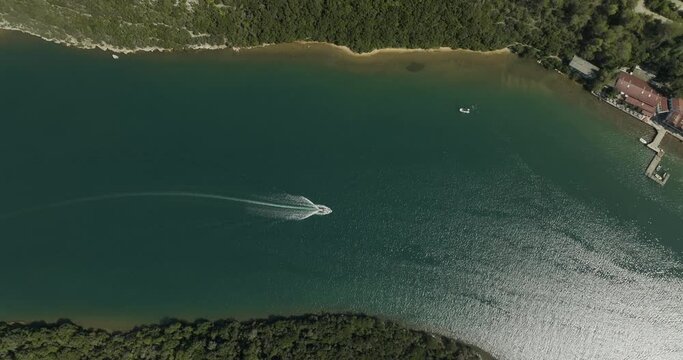 Aerial view of boats sailing along the Limski Fjord (Canal di Leme) in Sveti Lovrec, Istria, Croatia.