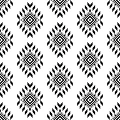Geometric tribal ornament design with seamless repeat pattern. Aztec and Navajo ethnic style. Black and white color. Design for textile, fabric, curtain, rug, shirt, frame.