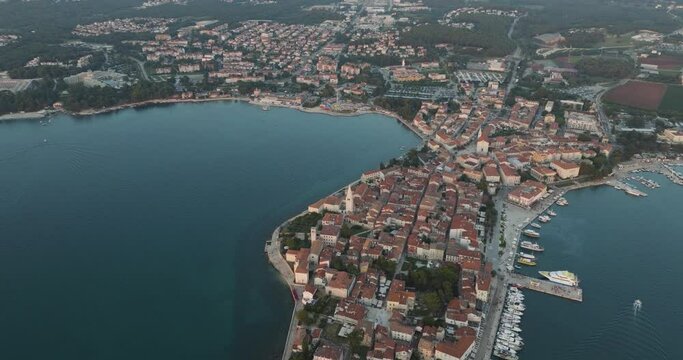Aerial view of Porec at sunset, a small town along the Adriatic Sea coastline in Istria, Croatia.
