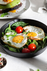 Fried eggs on a pan for breakfast