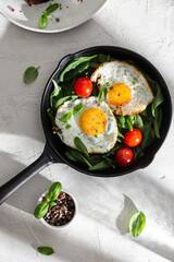 Fried eggs on a pan for breakfast