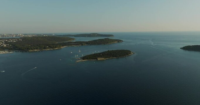 Aerial view of Brijuni National Park at sunset, a group of islands along the Adriatic Sea coastline near Pula, Istria, Croatia.
