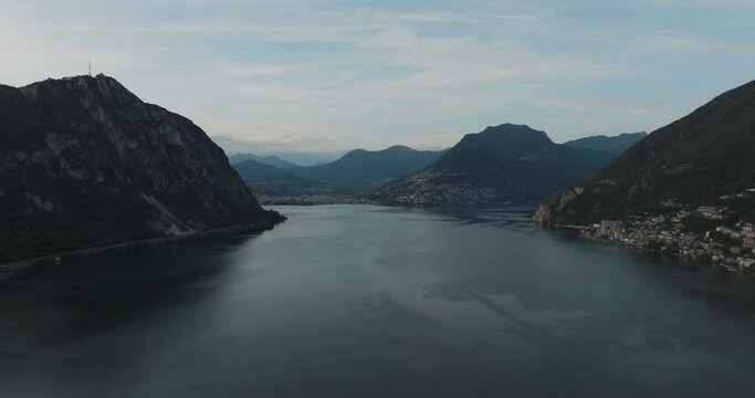 Aerial view of Lugano lake at sunset, Melide, Ticino, Switzerland.