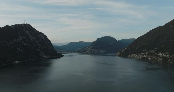 Aerial view of Lugano lake at sunset, Melide, Ticino, Switzerland.