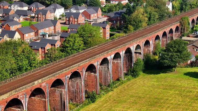 Aerial video of Whalley Viaduct, also known as Whalley Arches. Build between 1836 to 1850 the 605 meters long bridge is a magnificent superstructure. 