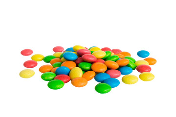 Multicolor small mixed colored chocolate coated candies, isolated on white