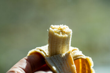 close up of a half eaten a banana