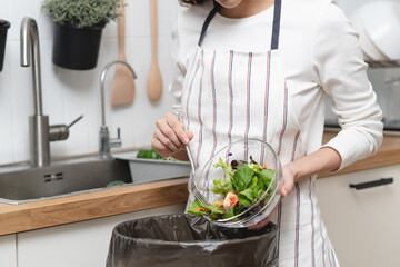 Fototapeta premium Food waste environment concept, people throwing food garbage into bin prepare to decompose.