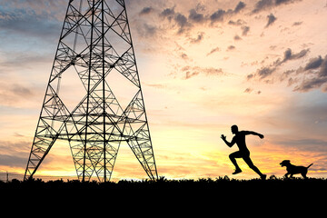 Silhouette of high voltage pole, electrical energy security concept.