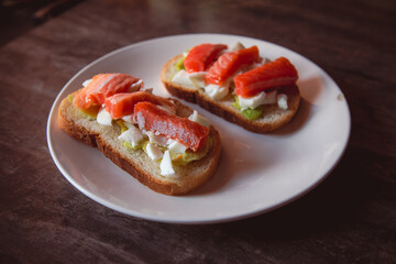 Homemade sandwich with fish and avocado