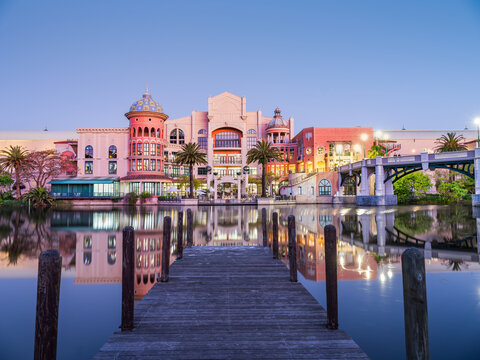 Canal Walk view from the wooden pier with lights reflection on the canal, Century City, Cape Town, South Africa