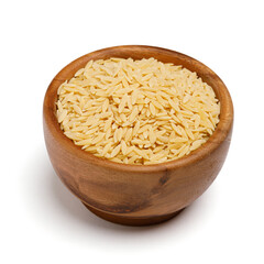 Uncooked dried cavatelli in wooden bowl on isolated white background. 