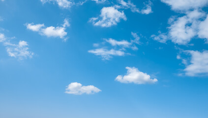 Naklejka na ściany i meble Blue sky with white clouds. Wispy Clouds in Blue Sky. Cloudscape - Blue sky and white clouds