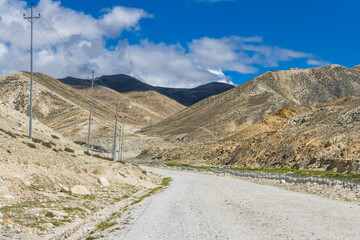 Dark Clouds HImalayan Mountains and Road to Korala Border between Tibet China and Upper Mustang,...