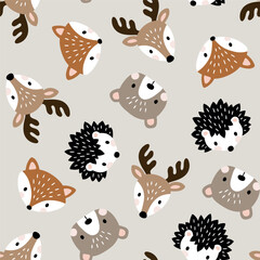 Seamless vector pattern with cute woodland animal heads. Perfect for textile, wallpaper or print design.