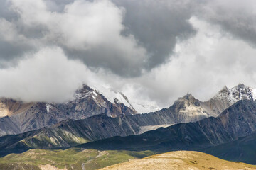 Dark Clouds HImalayan Mountains and Road to Korala Border between Tibet China and Upper Mustang,...