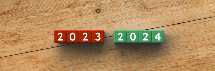 3D Cubes with the words 2023-2324 on a wooden background