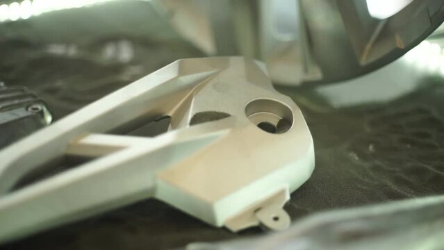 sandblasting machine for sandblasted parts and parts