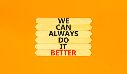 We make it better symbol. Concept words We can always do it better on wooden stick. Beautiful orange table orange background. Business we make it better concept. Copy space.