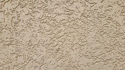 Pink decorative relief . Pink stucco wall. Pink background of the wall.