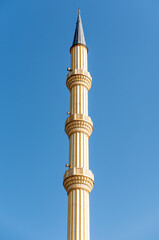 one minaret of traditional Islamic mosque in Grozny Chechnya