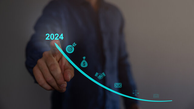 Business goals trends 2024. analytical businessperson planning business growth 2024, strategy digital marketing, profit income, economy, stock market trends and business, technical analysis strategy.