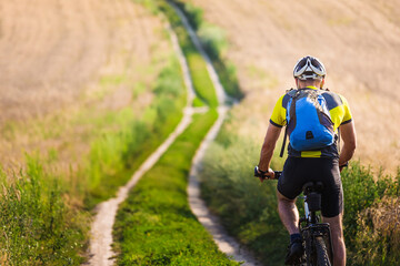 Obraz na płótnie Canvas Cyclist on mountain bike riding outdoor. Healthy, sport Lifestyle
